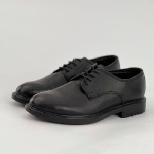 A simple black lace-up shoe